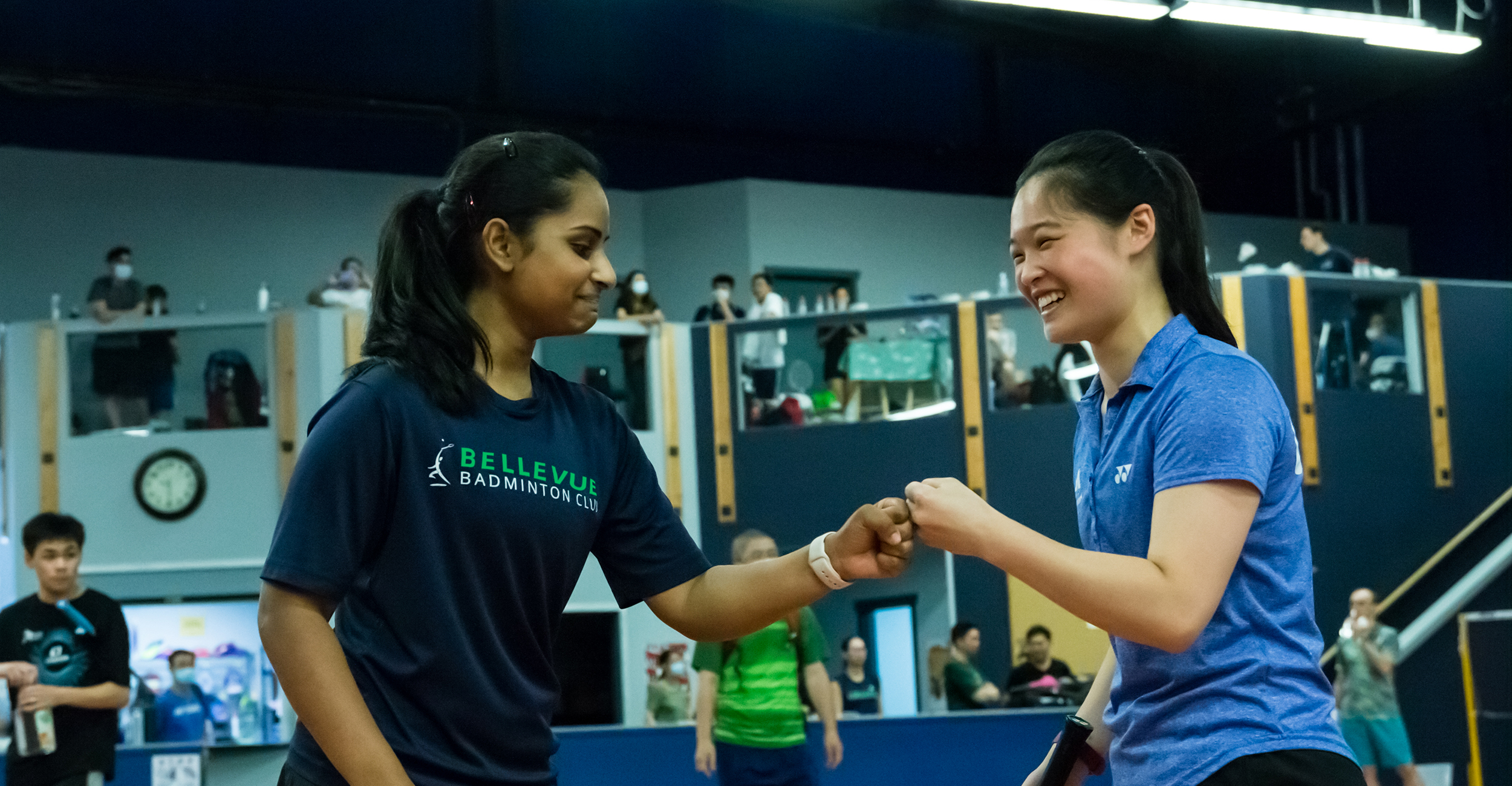 Badminton players fist bump